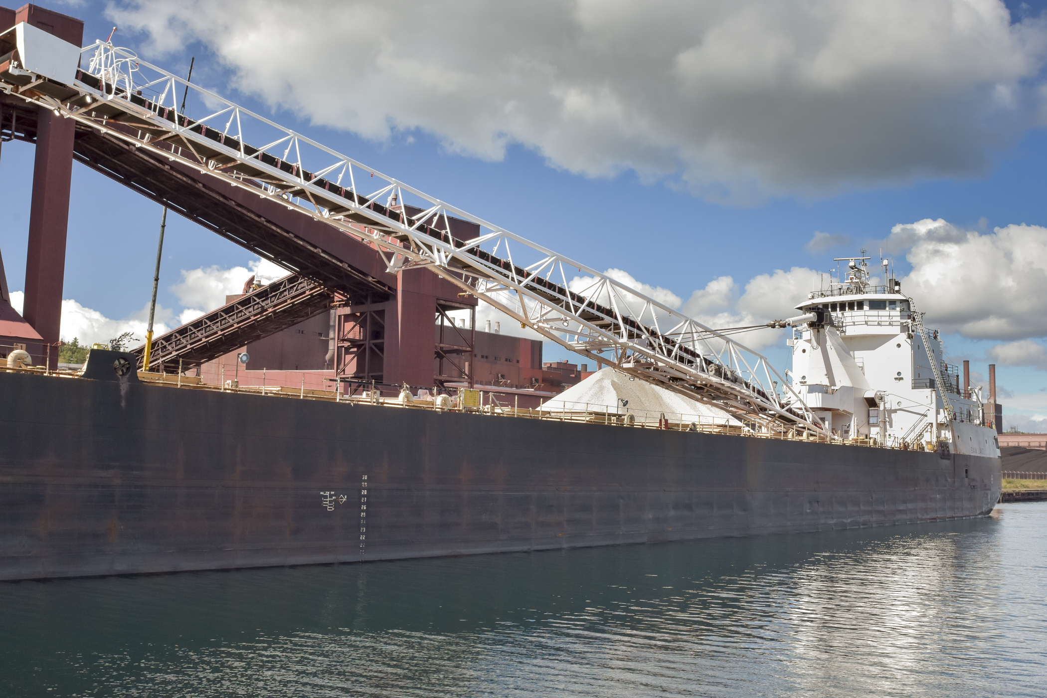 An ore ship on the shores of Lake Superior in northeastern Minnesota. HF27 would authorize up to 26 weeks of additional unemployment insurance benefits for recently laid off mine employees. (House Photography file photo)